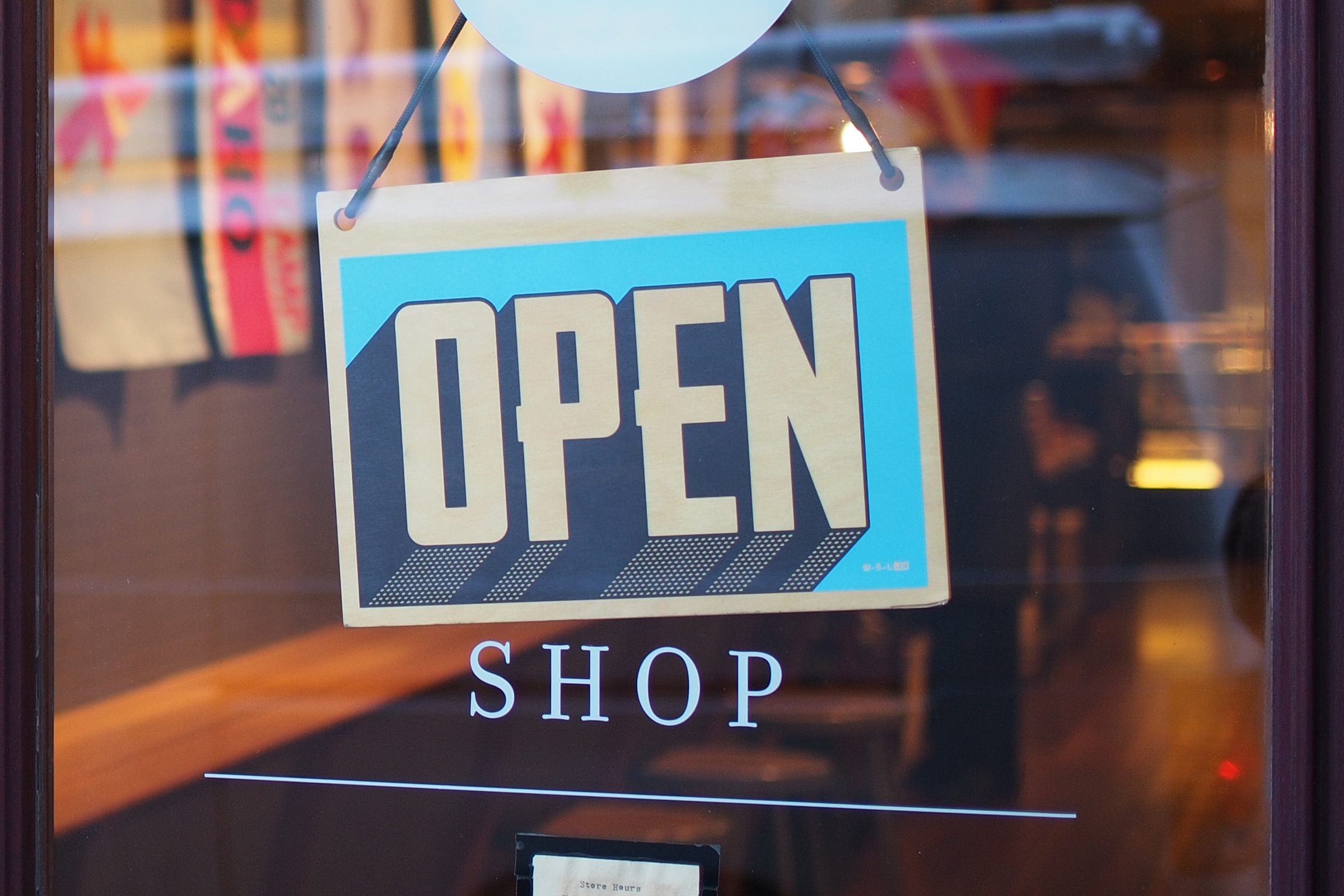 An open sign in a shop window